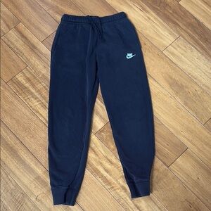 Nike Black Sweatpants with Elastic Cuffs and Tapered Fit